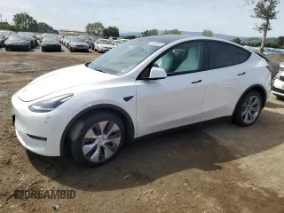 2023 Tesla Model Y Long Range z VIN 7SAYGDEE3PF815088, wystawiony jako Copart lot #54849895 z przebiegiem 19 637 mil mil oraz Szkoda całkowita • Salvage title. Historia ofert i sprzedaży dostępna na DreamBid. Obrazek 1.
