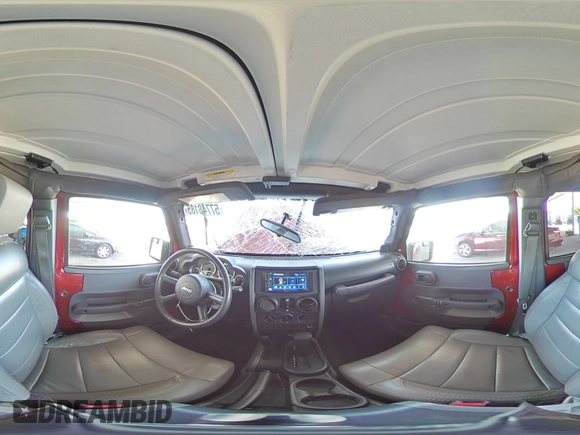 2010 Jeep Wrangler Unlimited Rubicon with VIN 1J4BA6H18AL197855, listed as a Copart auction lot 57748185 with 147,899 mi miles and Salvage title. Bid and sale history available at DreamBid. Image 14.