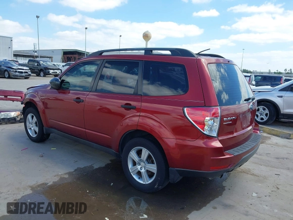 2012 Subaru Forester X with VIN JF2SHBBC5CH430957, listed as a IAAI auction lot 42020033 with 90,216 mi miles and . Bid and sale history available at DreamBid. Image 3.