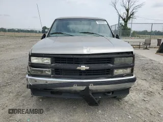 1999 Chevrolet Tahoe Z71 with VIN 1GNEK13R6XJ301562, listed as a Copart auction lot 59684595 with 200,561 mi miles and Salvage title. Bid and sale history available at DreamBid. Image 5.