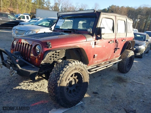 2010 Jeep Wrangler Unlimited Sport with VIN 1J4BA3H17AL107173, listed as a IAAI auction lot 41361595 with 245,624 mi miles. Bid and sale history available at carsss.com. Image 2.