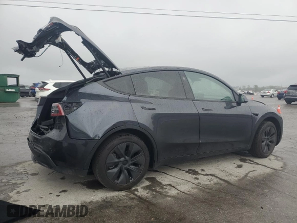 2024 Tesla Model Y with VIN 7SAYGDED1RA321691, listed as a Copart auction lot 52153945 with 7,544 mi miles and Salvage Title. Bid and sale history available at DreamBid. Image 3.