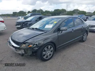 2009 Honda Civic LX z VIN 2HGFA16599H369479, wystawiony jako IAAI lot #41489267 z przebiegiem 143 297 mil mil oraz . Historia ofert i sprzedaży dostępna na DreamBid. Obrazek 17.