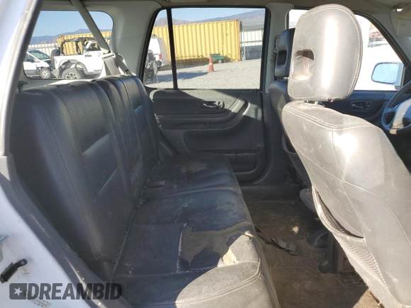 2000 Honda CR-V SE z VIN JHLRD1876YS019786, wystawiony jako Copart lot #88793865 z przebiegiem 168 507 mil mil oraz Szkoda całkowita • Salvage title. Historia ofert i sprzedaży dostępna na DreamBid. Obrazek 11.