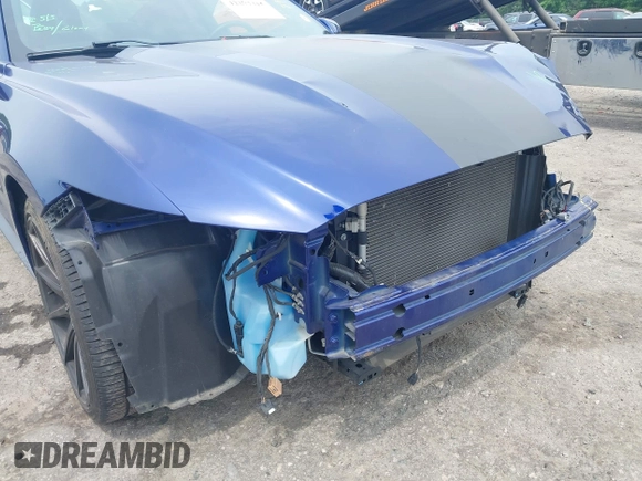 2016 Ford Mustang V6 z VIN 1FA6P8AM5G5271029, wystawiony jako IAAI lot #42277315 z przebiegiem 39 496 mil mil oraz . Historia ofert i sprzedaży dostępna na DreamBid. Obrazek 18.