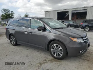 2016 Honda Odyssey Touring Elite с VIN 5FNRL5H99GB090100, выставлен на аукционе Copart как лот 52367795 с пробегом 60 615 миль миль и Списание • Salvage title. История ставок и продаж доступна на DreamBid. Изображение 4.
