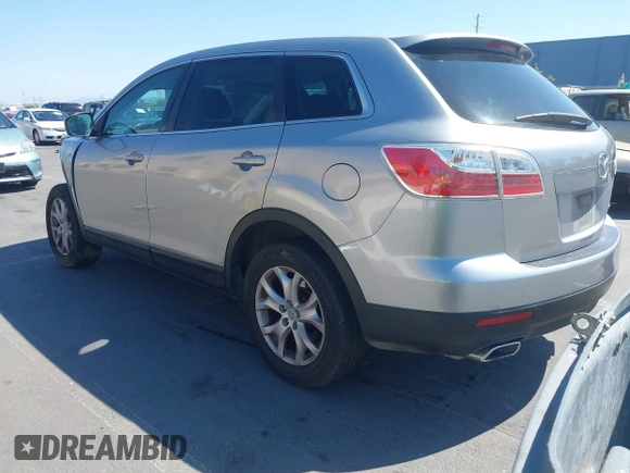2011 Mazda CX-9 Sport with VIN JM3TB2BVXB0307360, listed as a IAAI auction lot 42580629 with 136,928 mi miles and . Bid and sale history available at DreamBid. Image 3.