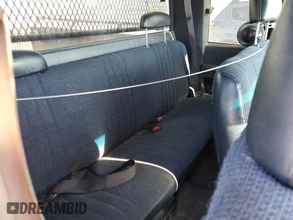 1995 GMC Sierra 1500 z VIN 2GTEK19K3S1591653, wystawiony jako Copart lot #75799124 z przebiegiem 329 311 mil mil oraz Nie do naprawy. Historia ofert i sprzedaży dostępna na DreamBid. Obrazek 10.