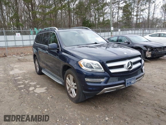 2015 Mercedes-Benz GL-Class GL 450 with VIN 4JGDF6EE9FA513009, listed as a IAAI auction lot 41311164 with 121,185 mi miles. Bid and sale history available at carsss.com. Image 1.
