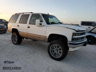 1999 Chevrolet Tahoe with VIN 1GNEC13R2XJ556769, listed as a Copart auction lot 77561624 with 205,238 mi miles and Non Repairable. Bid and sale history available at carsss.com. Image 4.