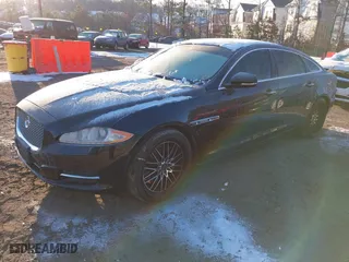 2012 Jaguar XJ with VIN SAJWA2GB0CLV25378, listed as a IAAI auction lot 41416644 with 90,582 mi miles. Bid and sale history available at carsss.com. Image 2.