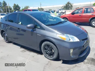 2015 Toyota Prius Four z VIN JTDKN3DU3F0446208, wystawiony jako IAAI lot #42397102 z przebiegiem 165 713 mil mil oraz . Historia ofert i sprzedaży dostępna na DreamBid. Obrazek 1.