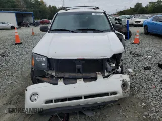 2005 GMC Envoy SLT with VIN 1GKDS13S652330496, listed as a Copart auction lot 73317234 with 191,138 mi miles and Salvage Title. Bid and sale history available at carsss.com. Image 5.