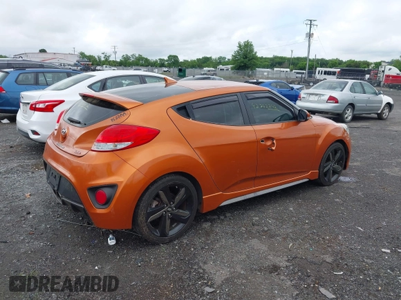 2013 Hyundai Veloster Turbo z VIN KMHTC6AE3DU124744, wystawiony jako IAAI lot #42242242 z przebiegiem 115 757 mil mil oraz . Historia ofert i sprzedaży dostępna na DreamBid. Obrazek 4.