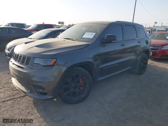 2015 Jeep Grand Cherokee SRT with VIN 1C4RJFDJ9FC842448, listed as a IAAI auction lot 41850385 with 178,439 mi miles. Bid and sale history available at carsss.com. Image 17.