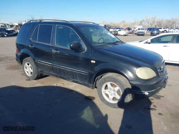 2001 Mercedes-Benz M-Class with VIN 4JGAB54E31A269408, listed as a IAAI auction lot 41642163 with 1 mi miles. Bid and sale history available at carsss.com. Image 1.