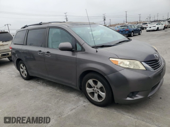 2012 Toyota Sienna LE AAS with VIN 5TDKK3DC0CS242667, listed as a Copart auction lot 65041005 with 196,322 mi miles and Clean title. Bid and sale history available at DreamBid. Image 4.