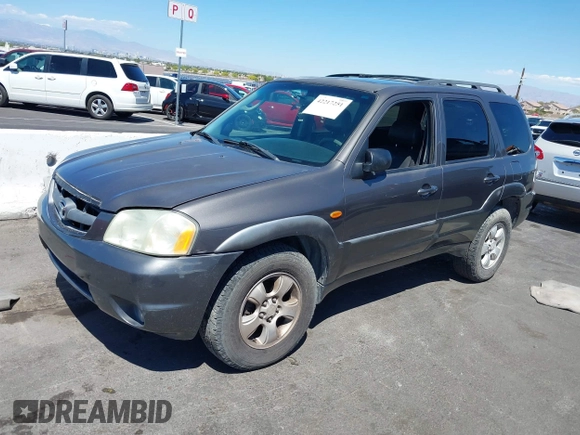 2003 Mazda Tribute ES with VIN 4F2CZ96113KM52877, listed as a IAAI auction lot 42217251 with 218,475 mi miles and . Bid and sale history available at DreamBid. Image 12.