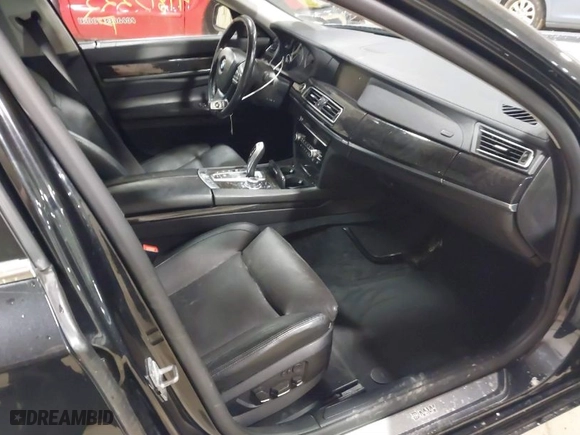 2012 BMW 7 Series 750Li xDrive with VIN WBAKC8C57CC435569, listed as a IAAI auction lot 41813222 with 139,751 mi miles. Bid and sale history available at carsss.com. Image 5.