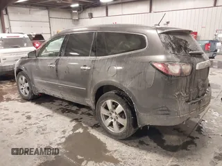 2015 Chevrolet Traverse LTZ with VIN 1GNKVJKD8FJ360899, listed as a IAAI auction lot 41634924 with 165,835 mi miles and . Bid and sale history available at DreamBid. Image 3.