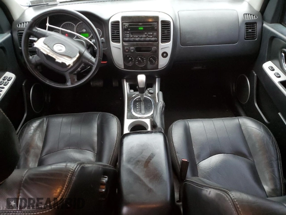 2006 Mercury Mariner Luxury с VIN 4M2CU57146KJ15124, выставлен на аукционе Copart как лот 84397234 с пробегом 232 920 миль миль и Списание • Salvage title. История ставок и продаж доступна на DreamBid. Изображение 8.