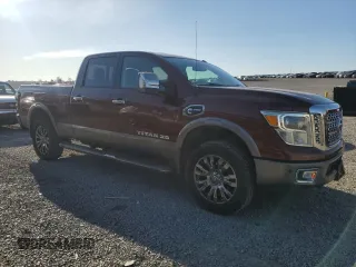 2016 Nissan Titan Platinum Reserve z VIN 1N6BA1F23GN509157, wystawiony jako Copart lot #50180435 z przebiegiem 135 035 mil mil oraz Czysty tytuł • Clean title. Historia ofert i sprzedaży dostępna na DreamBid. Obrazek 4.