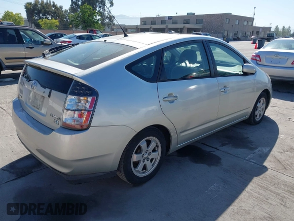 2005 Toyota Prius with VIN JTDKB20U253040216, listed as a IAAI auction lot 42142428 with 292,772 mi miles. Bid and sale history available at carsss.com. Image 4.