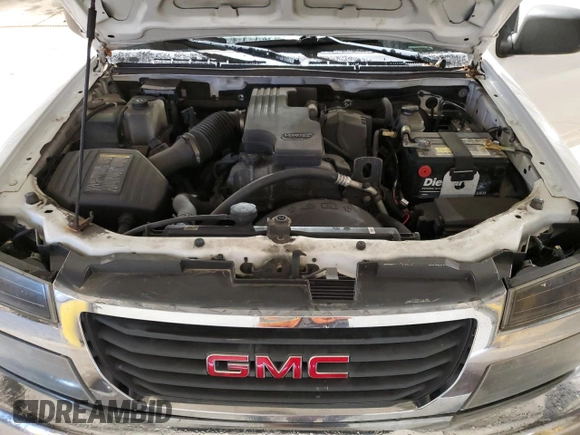 2010 GMC Canyon with VIN 1GTCSBD90A8112618, listed as a Copart auction lot 84184414 with 135,683 mi miles and Salvage title. Bid and sale history available at DreamBid. Image 11.
