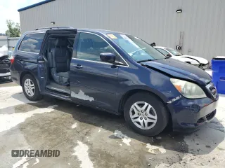 2005 Honda Odyssey EX-L z VIN 5FNRL38775B014777, wystawiony jako Copart lot #56245735 z przebiegiem 222 798 mil mil oraz Szkoda całkowita • Salvage title. Historia ofert i sprzedaży dostępna na DreamBid. Obrazek 4.