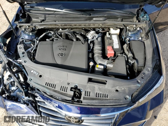 2022 Toyota Avalon XLE z VIN 4T1JZ1FB5NU078911, wystawiony jako Copart lot #67386182 z przebiegiem 6 941 mil mil oraz . Historia ofert i sprzedaży dostępna na DreamBid. Obrazek 12.