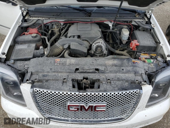 2014 GMC Yukon Denali with VIN 1GKS2EEF1ER212412, listed as a Copart auction lot 50954565 with 115,964 mi miles and Salvage Title. Bid and sale history available at carsss.com. Image 12.