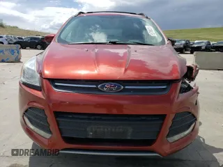 2016 Ford Escape SE z VIN 1FMCU9G9XGUC27074, wystawiony jako Copart lot #55788625 z przebiegiem 106 990 mil mil oraz Szkoda całkowita • Salvage title. Historia ofert i sprzedaży dostępna na DreamBid. Obrazek 5.