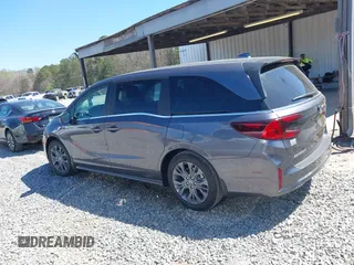 2025 Honda Odyssey Touring z VIN 5FNRL6H84SB028769, wystawiony jako IAAI lot #41856080 z przebiegiem Nie podano mil oraz . Historia ofert i sprzedaży dostępna na DreamBid. Obrazek 13.