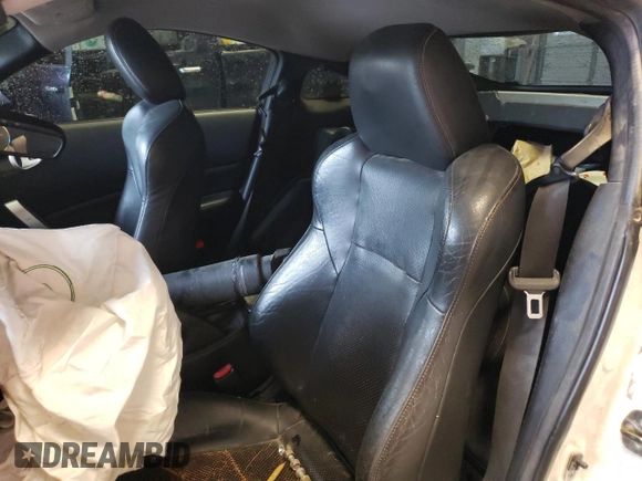 2007 Nissan 350Z with VIN JN1BZ34D77M500028, listed as a Copart auction lot 62935404 with 180,593 mi miles and Salvage Title. Bid and sale history available at DreamBid. Image 10.