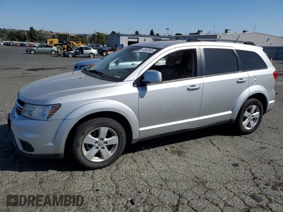 2012 Dodge Journey SXT z VIN 3C4PDDBG0CT293331, wystawiony jako Copart lot #62602995 z przebiegiem 185 605 mil mil oraz Szkoda całkowita • Salvage title. Historia ofert i sprzedaży dostępna na DreamBid. Obrazek 1.