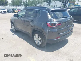 2022 Jeep Compass Latitude with VIN 3C4NJCBB4NT137245, listed as a IAAI auction lot 42356177 with 95,577 mi miles and . Bid and sale history available at DreamBid. Image 3.