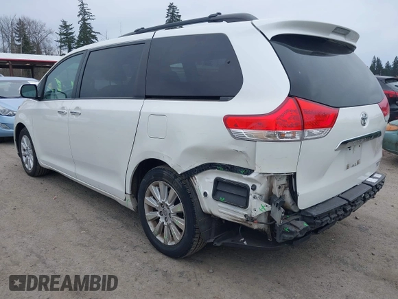 2014 Toyota Sienna Ltd with VIN 5TDDK3DC5ES073175, listed as a IAAI auction lot 41818572 with 107,971 mi miles. Bid and sale history available at carsss.com. Image 3.