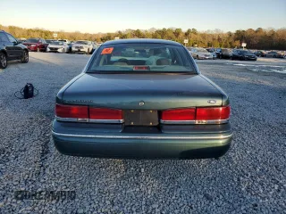 1996 Ford Crown Victoria LX z VIN 2FALP74W0TX205507, wystawiony jako Copart lot #85310874 z przebiegiem 51 646 mil mil oraz Szkoda całkowita • Salvage title. Historia ofert i sprzedaży dostępna na DreamBid. Obrazek 6.