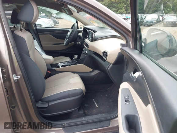 2020 Hyundai Santa Fe SE with VIN 5NMS23AD4LH142202, listed as a IAAI auction lot 42526020 with 59,964 mi miles and . Bid and sale history available at DreamBid. Image 5.