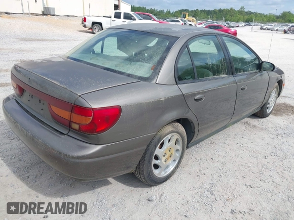 2000 Saturn SL z VIN 1G8ZK527XYZ121984, wystawiony jako IAAI lot #42099839 z przebiegiem 174 210 mil mil oraz . Historia ofert i sprzedaży dostępna na DreamBid. Obrazek 4.