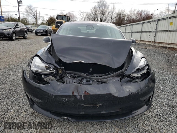 2019 Tesla Model 3 Long Range with VIN 5YJ3E1EB2KF197062, listed as a Copart auction lot 50874925 with 50,989 mi miles and Salvage Title. Bid and sale history available at carsss.com. Image 5.