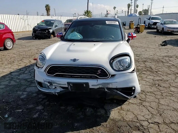 2019 MINI Countryman Cooper S с VIN WMZYT3C55K3E96002, выставлен на аукционе Copart как лот 43080985 с пробегом Не указан миль и Списание • Salvage title. История ставок и продаж доступна на DreamBid. Изображение 11.