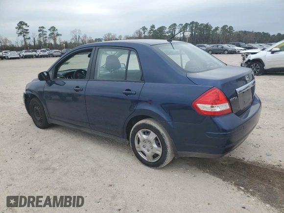2009 Nissan Versa 1.8 S with VIN 3N1BC11E49L500200, listed as a Copart auction lot 87227464 with 215,170 mi miles and Salvage Title. Bid and sale history available at carsss.com. Image 2.