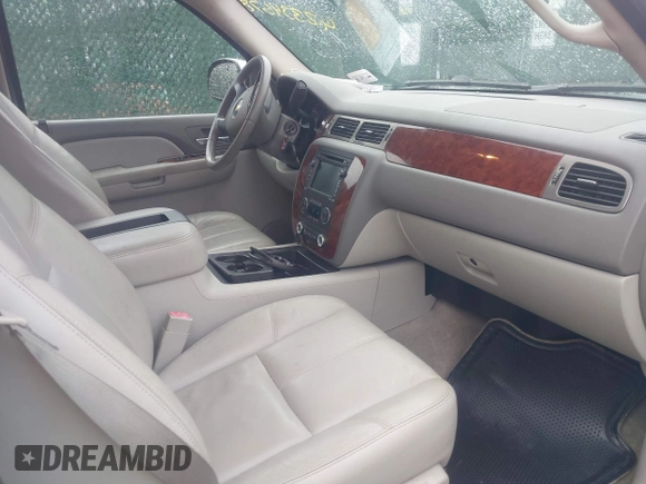 2009 Chevrolet Tahoe 2LT z VIN 1GNFC23059R217780, wystawiony jako IAAI lot #42334678 z przebiegiem 136 182 mil mil oraz . Historia ofert i sprzedaży dostępna na DreamBid. Obrazek 5.