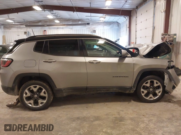2019 Jeep Compass Limited with VIN 3C4NJDCB0KT656468, listed as a IAAI auction lot 42221300 with 105,115 mi miles and . Bid and sale history available at DreamBid. Image 13.