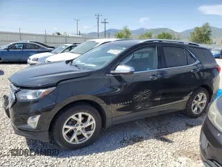 2019 Chevrolet Equinox Premier z VIN 2GNAXXEV9K6224334, wystawiony jako Copart lot #59735415 z przebiegiem 95 189 mil mil oraz Szkoda całkowita • Salvage title. Historia ofert i sprzedaży dostępna na DreamBid. Obrazek 1.