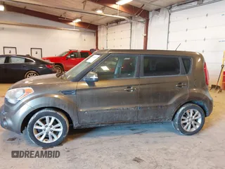 2012 Kia Soul + with VIN KNDJT2A64C7452975, listed as a IAAI auction lot 41635133 with 164,937 mi miles. Bid and sale history available at carsss.com. Image 14.