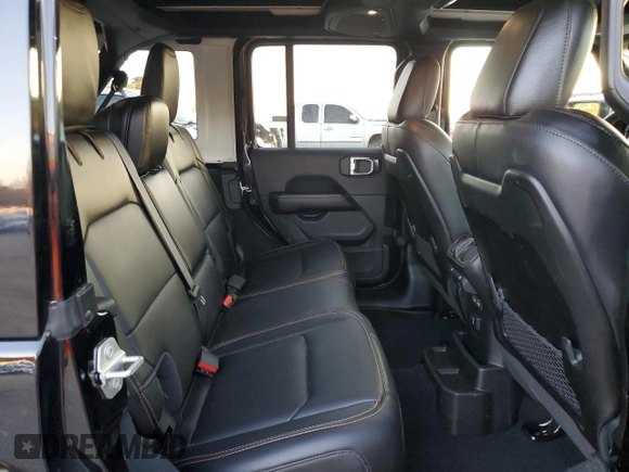 2024 Jeep Wrangler Sahara with VIN 1C4PJXENXRW118401, listed as a Copart auction lot 84731534 with 6,895 mi miles and Salvage Title. Bid and sale history available at DreamBid. Image 10.