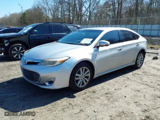 2013 Toyota Avalon XLE with VIN 4T1BK1EB5DU029619, listed as a IAAI auction lot 41758252 with 152,393 mi miles. Bid and sale history available at carsss.com. Image 2.