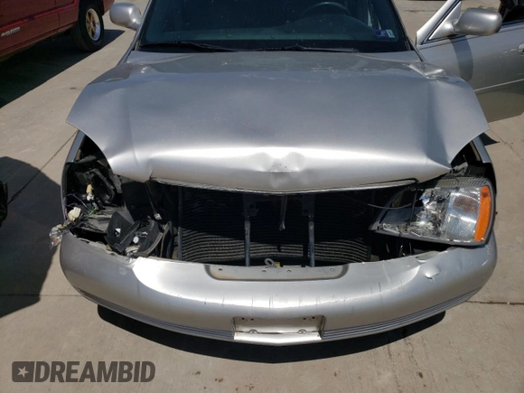 2004 Cadillac DeVille z VIN 1G6KD54Y14U196655, wystawiony jako Copart lot #50882364 z przebiegiem 80 588 mil mil oraz Szkody całkowita. Historia ofert i sprzedaży dostępna na DreamBid. Obrazek 11.